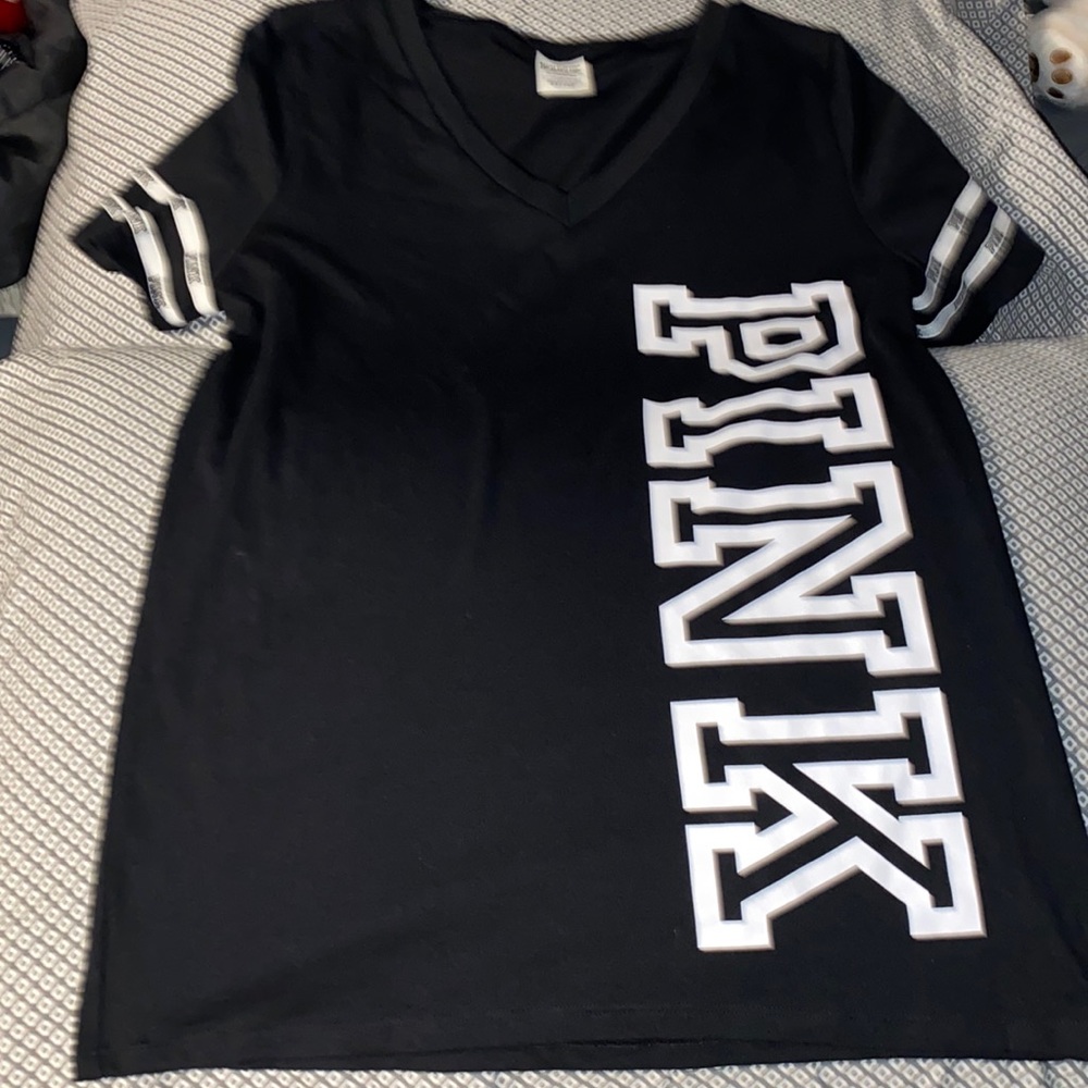 A black tee shirt from pink, size small,it’s new never worn